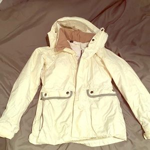 White ski or snowboarding jacket. Insulated
